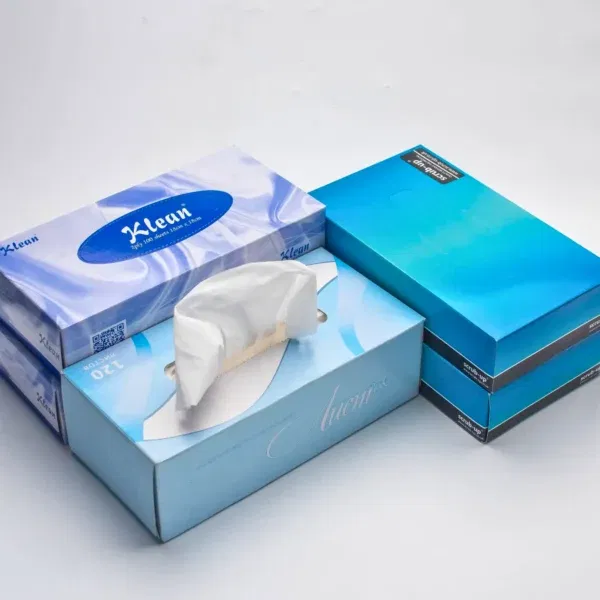 Assorted tissue boxes in various shades of blue.