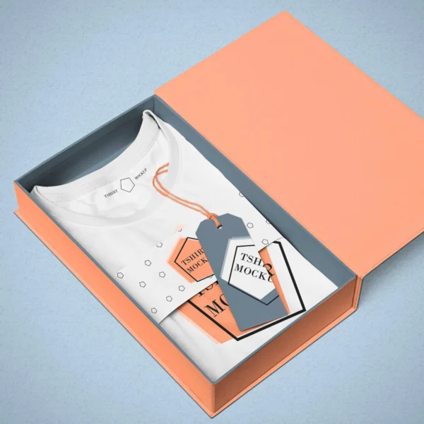 Custom orange shirt box with a white t-shirt and tags inside.